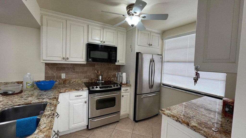 Photo of 6097 Balboa Circle #303, Boca Raton, FL 33433 (MLS # R11138481)