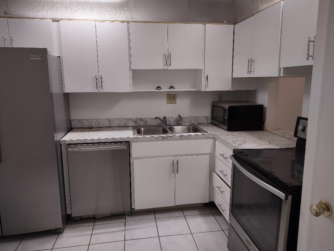 Over 55..Large,convenient ground floor unit with tiled floors throughout,upgraded cabinets in kitchen & bathroom,SS appliances and all within a secure,keyed entry bldg. Bathroom was recently retiled. Eat in kitchen with pantry plus a glass enclosed patio for even more space. Separate vanity area outside bathroom. Ample closets. Newer AC and WH. Unit to be cleaned and painted prior to start of new lease. Complex offers pools,gym,billiards,bowling along with large active Clubhouse. Friendly and conscientious landlord looking for reliable long term tenant. Must have min 650 credit and be able to provide a background check report to submit with application