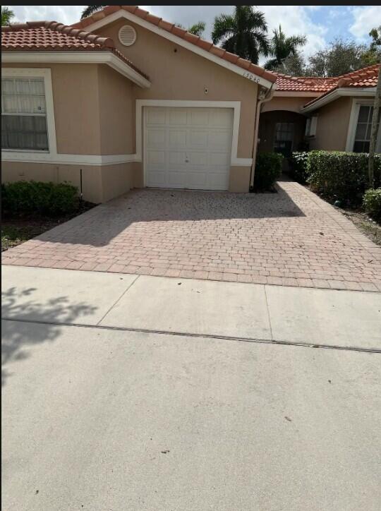 Photo of 13040 NW 5TH Street, Pembroke Pines, FL 33028 (MLS # B26072198)