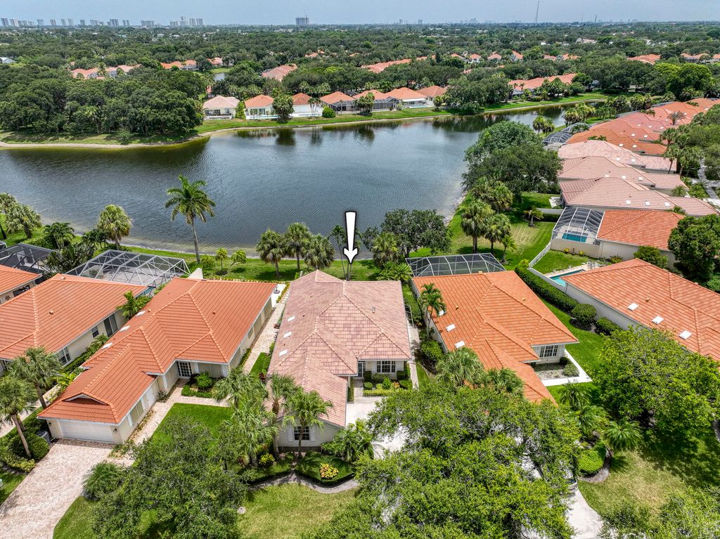 Photo of 105 Lost Bridge Drive, Palm Beach Gardens, FL 33410 (MLS # R11004354)