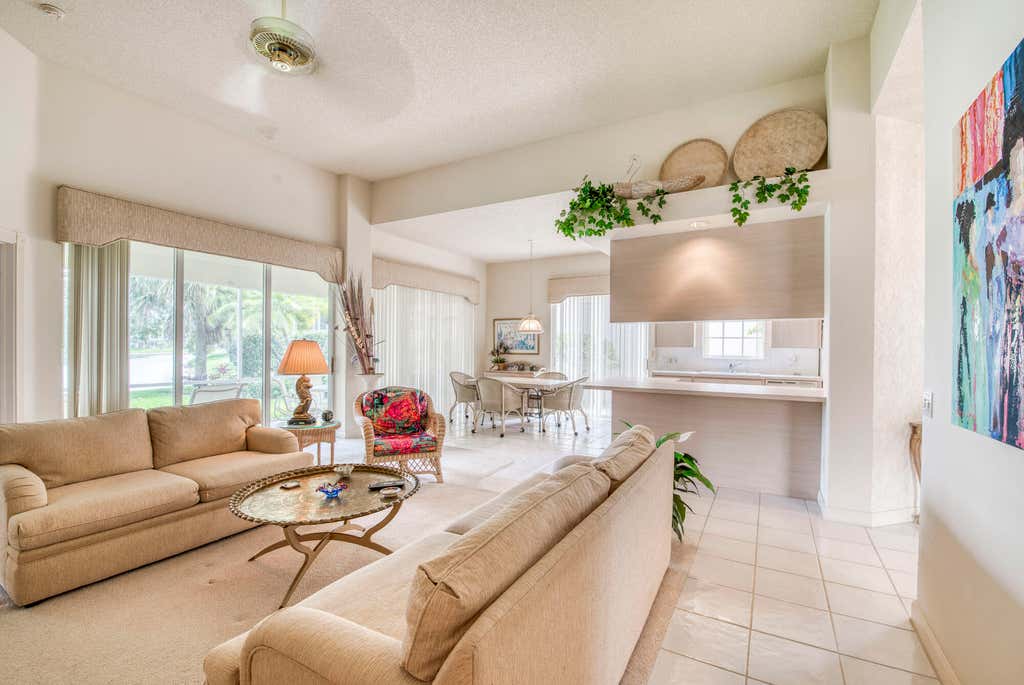 Photo of 105 Lost Bridge Drive, Palm Beach Gardens, FL 33410 (MLS # R11004354)