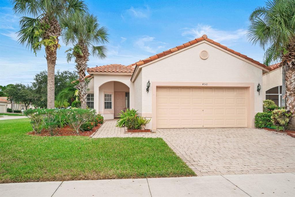 Photo of 450 NW Lismore Lane, Port Saint Lucie, FL 34986 (MLS # R10754627)