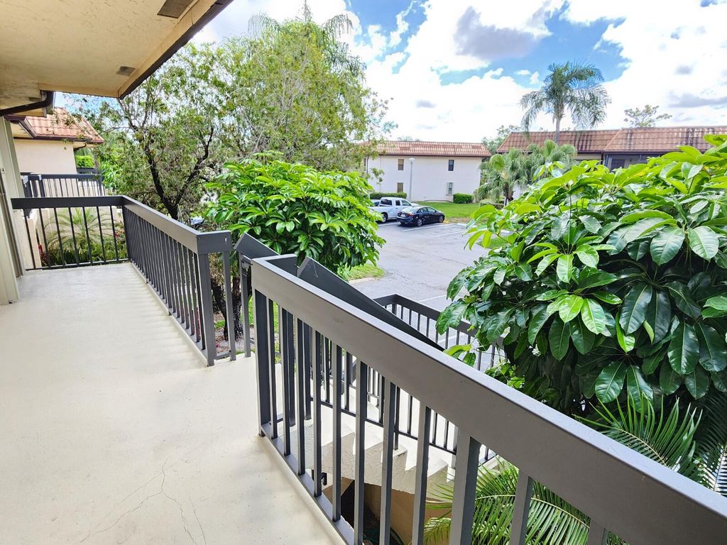 Photo of 7149 Golf Colony Court #201, Lake Worth, FL 33467 (MLS # B26001709)