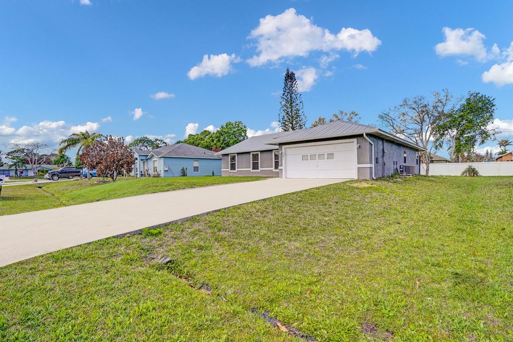 Photo of 261 SW Parish Terrace, Port Saint Lucie, FL 34984 (MLS # B26000686)