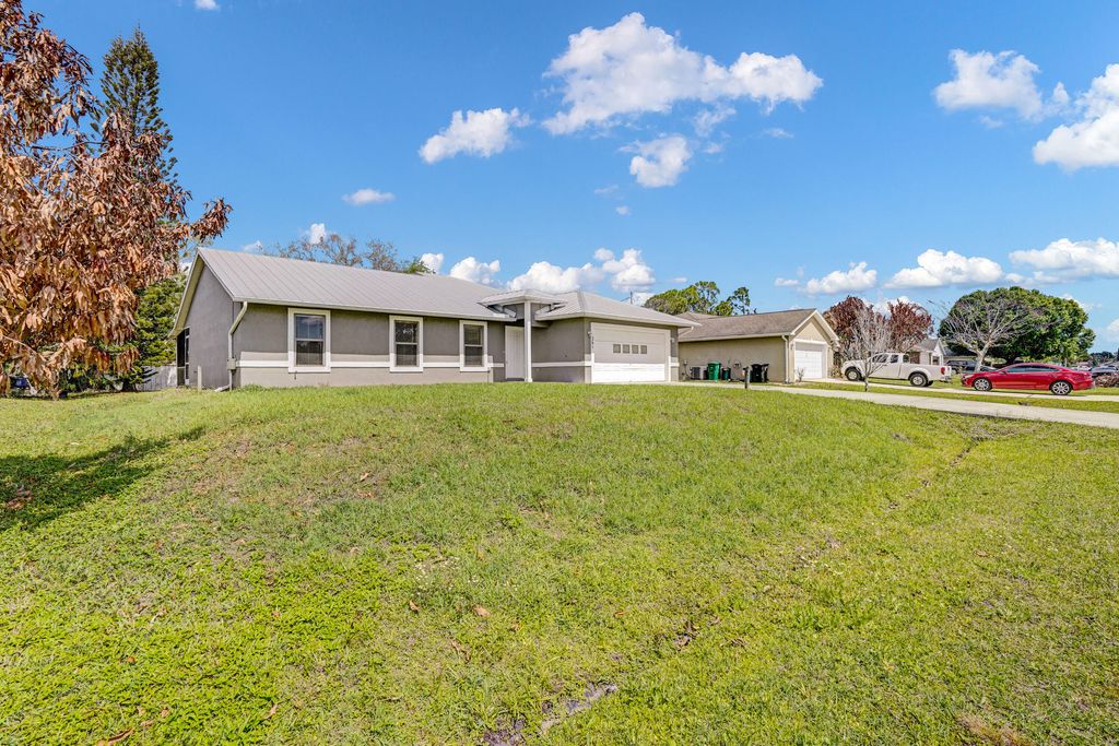 Photo of 261 SW Parish Terrace, Port Saint Lucie, FL 34984 (MLS # B26000686)