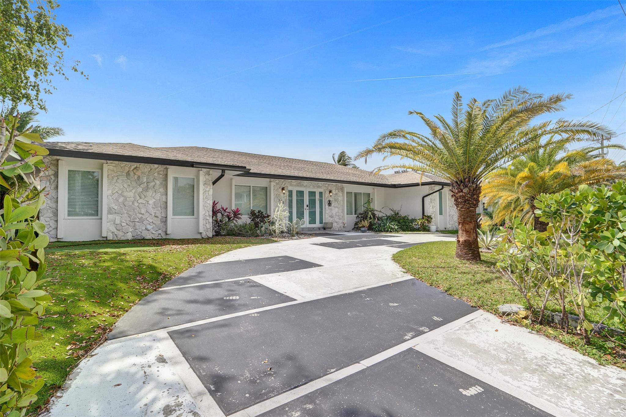 Stunning 5-bedroom, 3-bathroom waterfront home with direct ocean access, perfect for luxury living. This fully furnished gem features beautifully renovated bathrooms, a spacious open layout, and impact windows throughout for peace of mind. Enjoy your own private pool with serene water views, ideal for relaxing or entertaining. The outdoor area includes a kids’ playground, making it a family-friendly paradise. Located in a prime area, this home offers the perfect blend of comfort, style, and coastal living. (Dock is under renovation for next few month and cant be used)