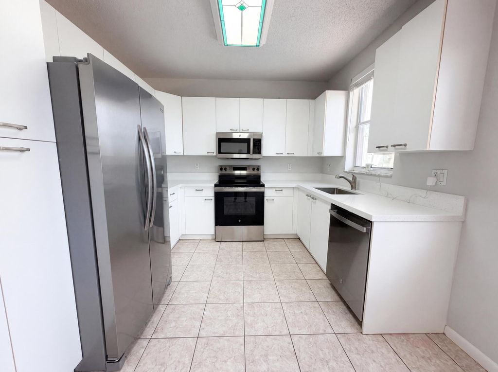 Photo of 7722 Oak Grove Cir, Lake Worth, FL 33467 (MLS # B26019546)