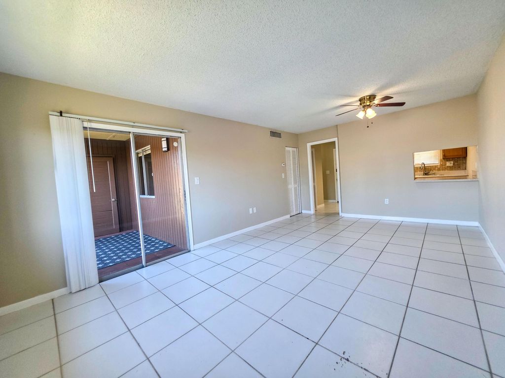 Photo of 6106 Forest Hill Boulevard #207, West Palm Beach, FL 33415 (MLS # B26008647)