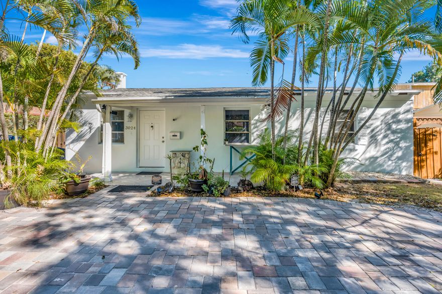 NO HOA, versatile property with private guest house in a prime central location. Located on a quiet, no thru street, the main home is an updated 3-bedroom / 1-bath featuring open layout & spacious bedrooms. A separate, renovated 1-bedroom / 1-bath guest house with its own A/C and laundry offers the perfect setup for extended family, guests, or the option to generate additional income. Both living spaces are independently and securely fenced, providing privacy and flexibility for a variety of living arrangements. Ideally located next to Rinker Athletic Campus, one block to Bill Moss Hillcrest Park and Belvedere Elementary, with quick access to everything: 2 minutes to I-95, 4 minutes to CityPlace, 7 minutes to the beach, close to Publix, and just 5 minutes to Palm Beach International (PBI). All information pertaining to the property is deemed reliable, but not guaranteed. Information to be verified by the Buyer. Be advised that cameras may exist recording audio and video inside/outside the property, such as ring doorbells. Photos are digitally enhanced and could be altered, please verify.