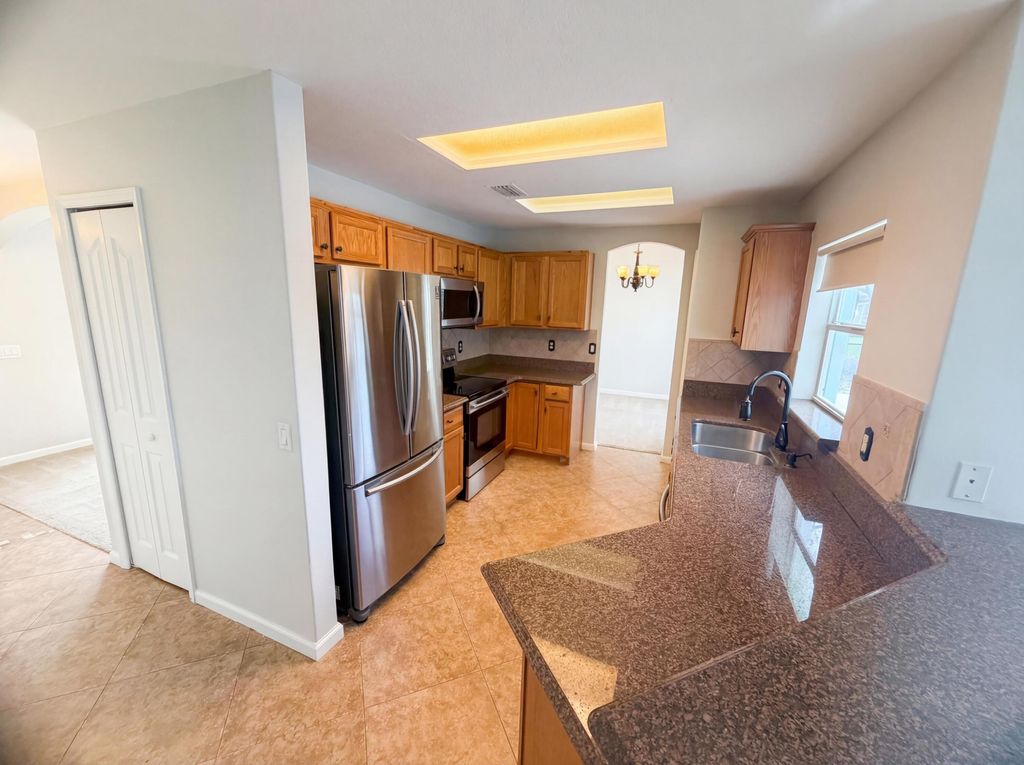 Photo of 2332 SE Berkshire Boulevard, Port Saint Lucie, FL 34952 (MLS # B26009918)