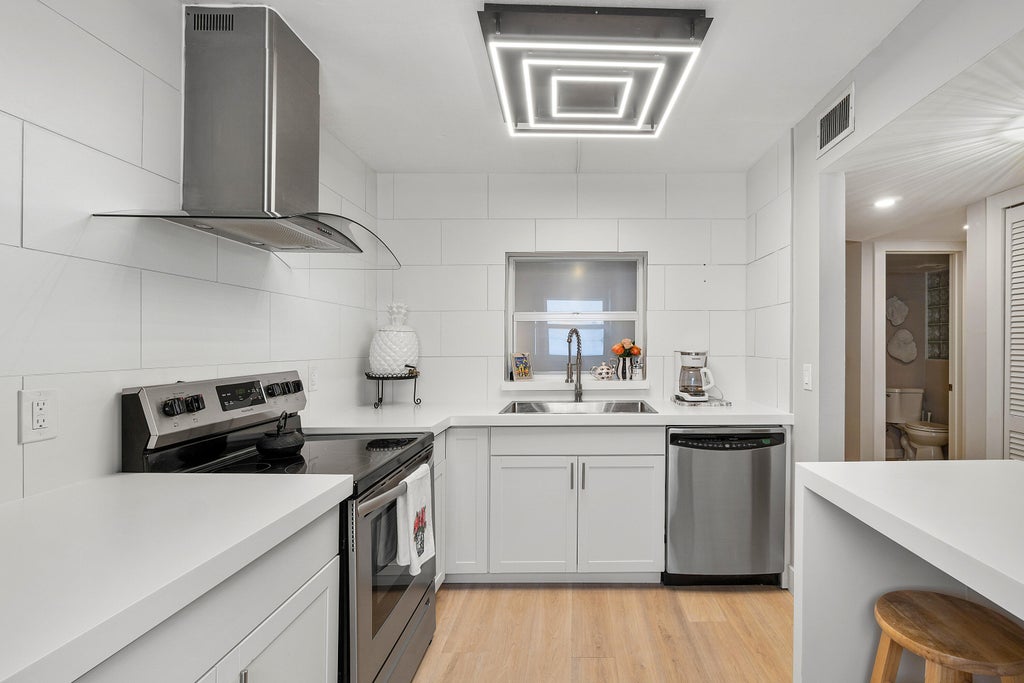 Photo of 2805 SW 22nd Avenue #Unit 104, Delray Beach, FL 33445 (MLS # B26038511)
