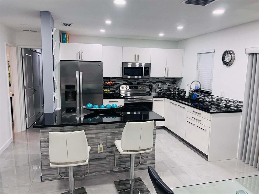 Photo of 500 Davis Road #36, Palm Springs, FL 33461 (MLS # R10875767)