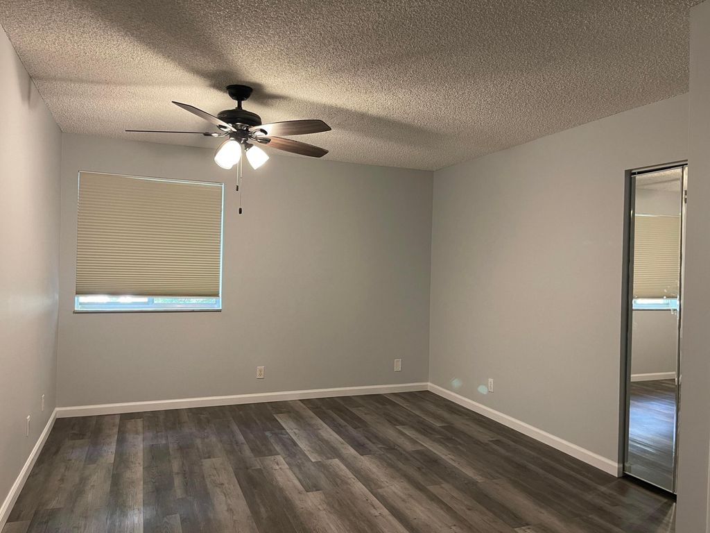 Photo of 1850 Fairview Villas Drive #3, Palm Springs, FL 33406 (MLS # R11149978)