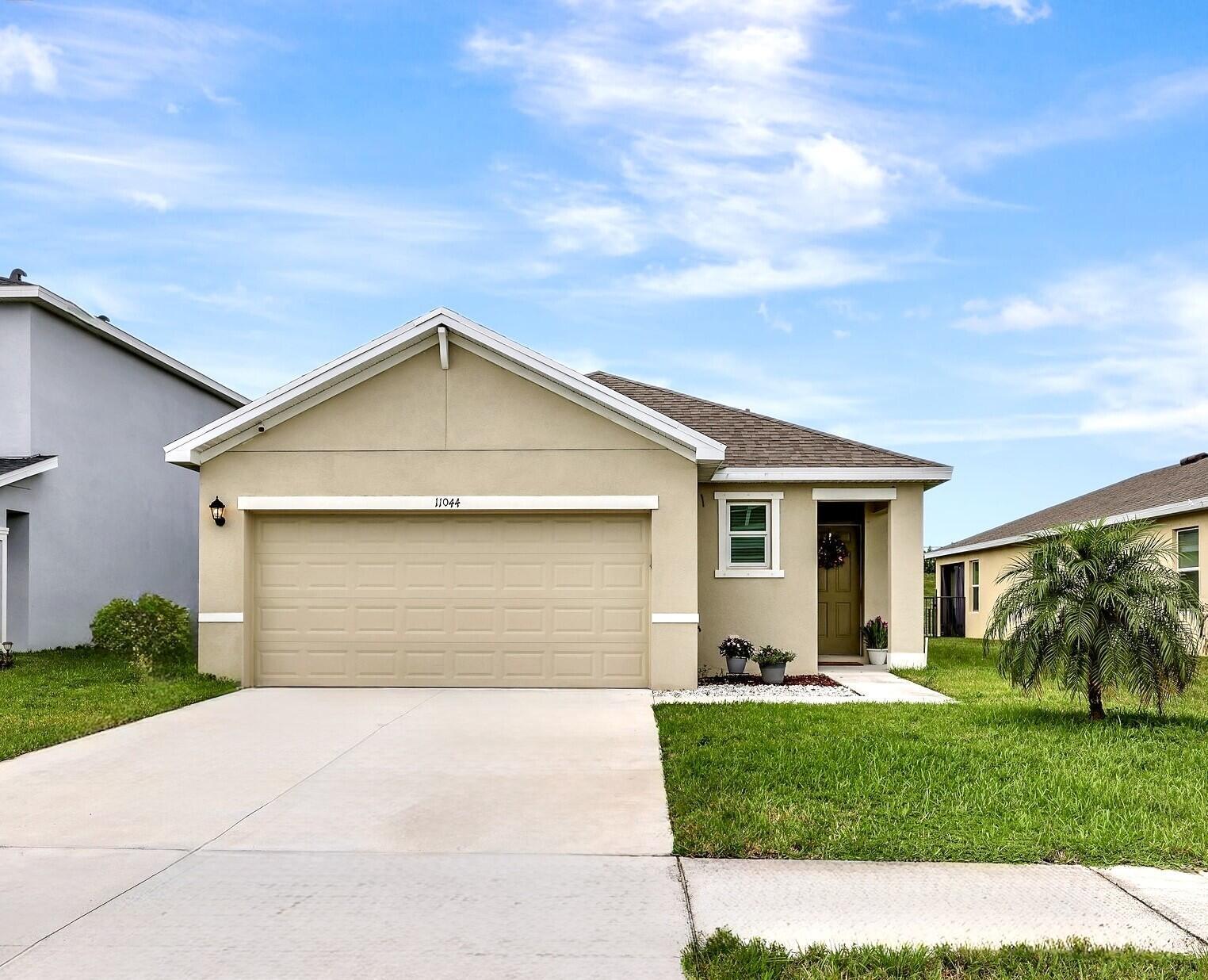 Carpet was recently removed and replaced with tile in bedrooms.This beautiful 3/2 home was built in 2022 and has all the smart home bells and whistles including wifi controlled thermostat & garage opener. layout optimizes living space with an open concept kitchen situated between the living area and dining room. The kitchen overlooks the living area and covered lanai. The owner's suite, located at the back of the home for privacy, has an Ensuite bathroom. Backyard is fenced in with 6ft privacy fencing and Lanai has been screened in. Community is very family friendly with lots of seasonal neighborhood events organized by the residents! Don't forget to check out the community pool and playground when you request a showing!