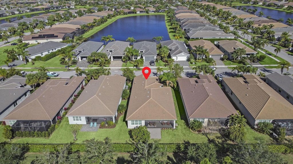 Photo of 11559 SW Half Moon Lake Lane, Port Saint Lucie, FL 34987 (MLS # R11086108)