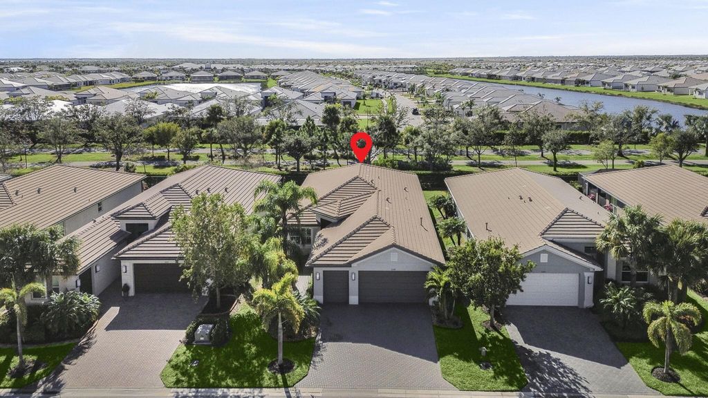 Photo of 11559 SW Half Moon Lake Lane, Port Saint Lucie, FL 34987 (MLS # R11086108)