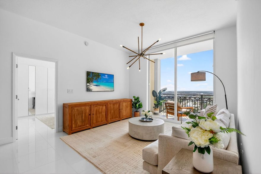 Spectacular Views, and a rarely available turnkey Penthouse, featuring a fully remodeled kitchen and both bathrooms! Wake up to serene, sparking blue waters of the Intracoastal & Ocean! This luxurious, apartment overlooking the Resort-Style Pool Deck, features sprawling, panoramic views of the Atlantic Ocean, & Intracoastal Waters! Perfectly situated in the heart of Downtown West Palm, this immaculate retreat offers everything you need to unwind and start living your best life. Double walk-in closets provide ample storage, and glossy white ceramic tile flooring throughout adds a touch of elegance to the space. The 150-SqFt doublewide balcony lets you breathe in the moment as you marvel at picturesque sunrises while you sip on your coffee or wine in your very own tropical oasis. This is the lifestyle you've been waiting for! CityPlace South Tower offers a full suite of resort-style amenities, including 24-hour concierge, valet parking, a state-of-the-art fitness center, designer club room, summer kitchen pavilion, and a stunning pool and spa deck overlooking the city. Exciting new renovations to the already-exquisite pool deck, clubroom, and conference room are now complete, further elevating this iconic Downtown address! Lobby entrance remodeling is also nearing completion scheduled for March 2026, promising an elevated and refreshed arrival experience! CityPlace South Tower is situated in the heart of booming Downtown West Palm Beach, where you're steps from world-class dining, shopping, the Kravis Center for the Performing Arts, the Brightline station, and all the cultural energy the city has to offer.   Downtown West Palm Beach is in the midst of a remarkable transformation, quickly becoming one of South Florida's most sought-after destinations for luxury living, investment, and innovation. With billions in new development underway - including Class-A office towers, five-star hotels, acclaimed restaurants like Eataly, Milos, and Harry's of New York, and expanded waterfront spaces - the area is attracting global attention and high-profile residents. West Palm Beach is also rapidly emerging as one of the country's most important financial and academic hubs, highlighted by the planned Vanderbilt University graduate campus downtown and the continued influx of major financial firms establishing headquarters and offices in the area. This unprecedented level of investment is driving the newest evolution of the city and positioning it for strong, long-term growth - making ownership here not only a lifestyle opportunity but a compelling investment as property values continue to rise. There's no question that West Palm Beach has now captured the industry's attention nationwide, and has firmly established itself at the intersection of culture, convenience, and world-class living. Your best life starts here - where luxury, location, and lifestyle come together seamlessly.