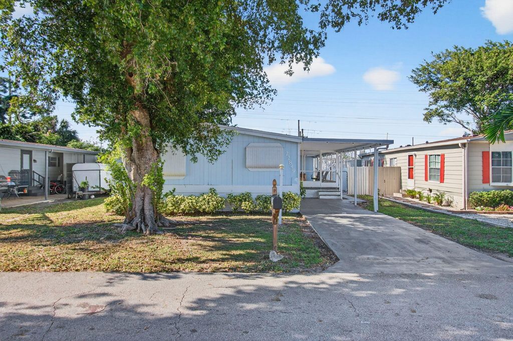 Photo of 22849 Tradewind Road, Boca Raton, FL 33428 (MLS # R11150973)