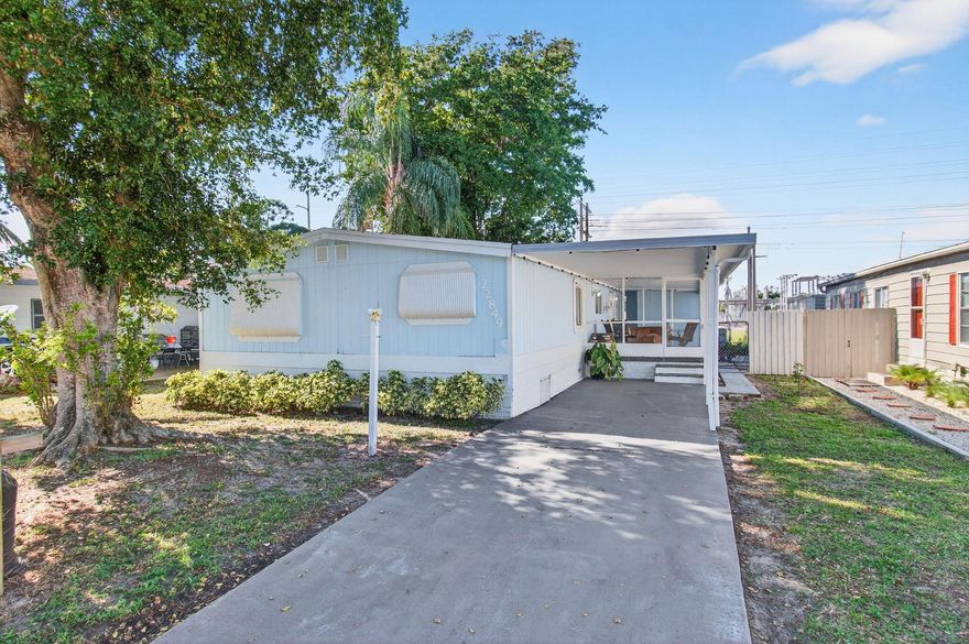 3 bed 2 bath mobile home with backyard and porch. Freshly painted throughout the inside and outside.