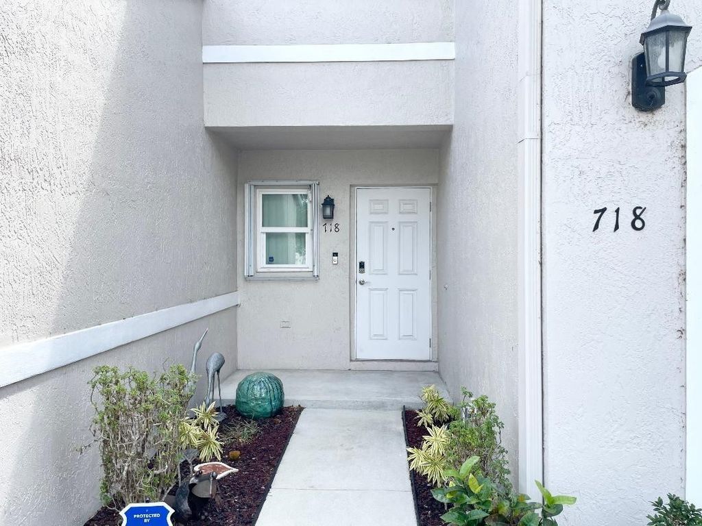 Photo of 718 NW 42nd Place #718, Deerfield Beach, FL 33064 (MLS # F10495684)