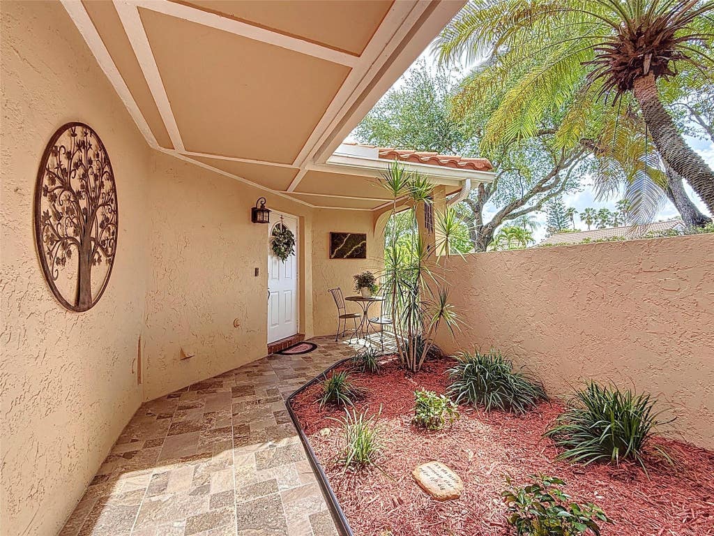 Photo of 1420 Seagrape Circle, Weston, FL 33326 (MLS # B26043631)