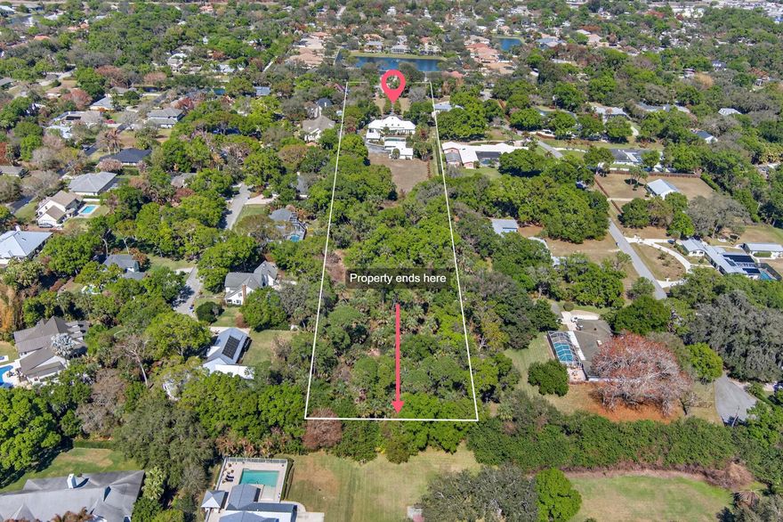 This rare Doctor's Row estate delivers true flexibility. The main residence offers 6 bedrooms plus a fully independent guest studio apartment with kitchen and bath—ideal for multigenerational living, guests, or income. Set on expansive, private grounds minutes to the beach with pool, barn/workshop, and room to expand. No HOA. A true compound combining space, privacy, and proximity to Vero's beaches, dining, and village amenities.