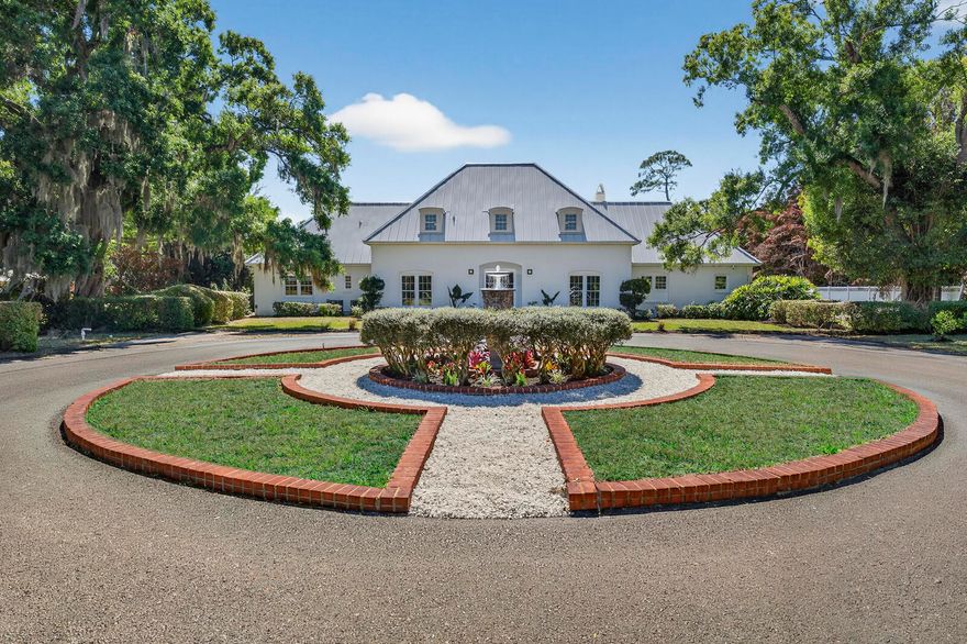 Tucked along prestigious Doctor's Row just minutes from the beach, this ''unicorn'' Vero Beach estate offers the privacy and flexibility of a true coastal compound without HOA restrictions. Recently renovated interiors showcase sophisticated architecture and timeless styling. Expansive grounds include a pool, guest house, barn/workshop, and generous open acreage ideal for multigenerational living, winter gatherings, or extended stays with family and friends. A distinctive retreat offering space, privacy, and room to expand while remaining close to Vero's beaches, dining, and village amenities.