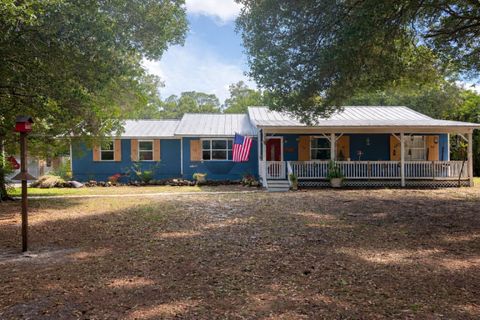 Photo of 7370 SW Rattlesnake Run, Palm City, FL 34990 (MLS # B26014343)