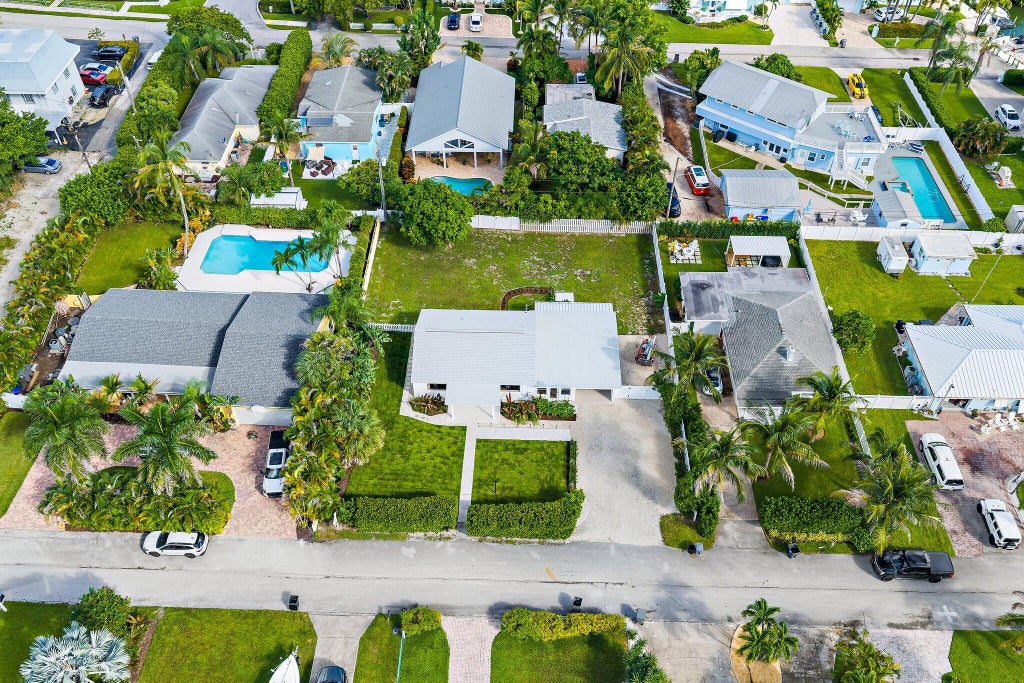 Photo of 3437 Palm Court, Jupiter, FL 33469 (MLS # B26083858)
