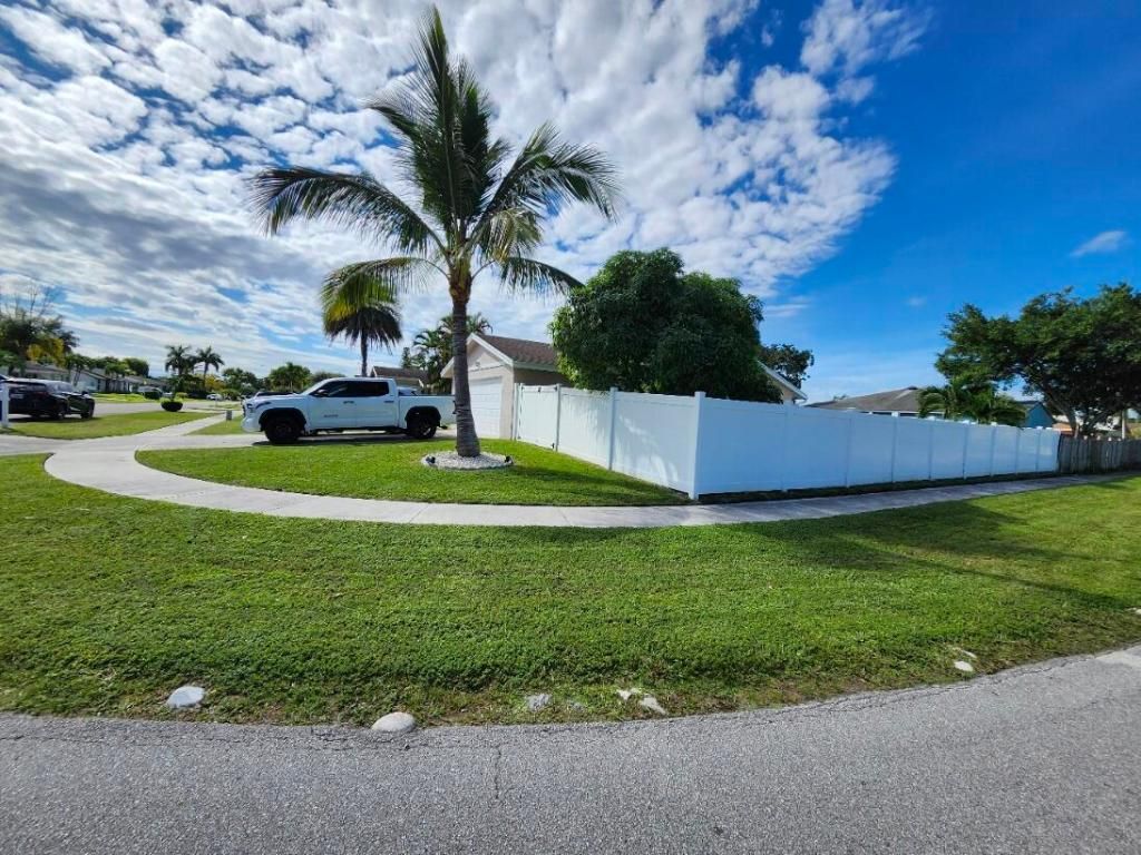 Photo of 1473 Donwoods Ln, Royal Palm Beach, FL 33411 (MLS # R11137290)