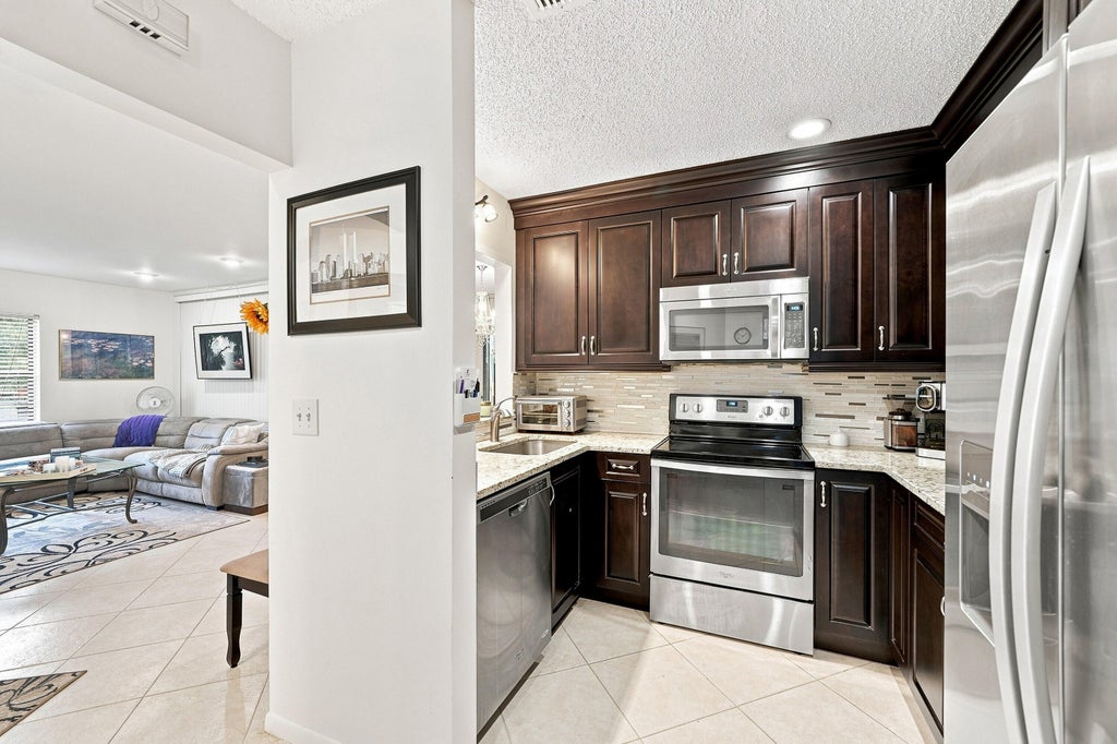 Photo of 5450 VERONA Drive #H, Boynton Beach, FL 33437 (MLS # B26070255)