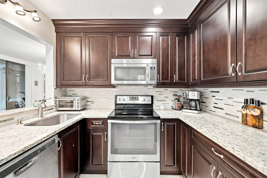 Photo of 5450 VERONA Drive #H, Boynton Beach, FL 33437 (MLS # B26070255)