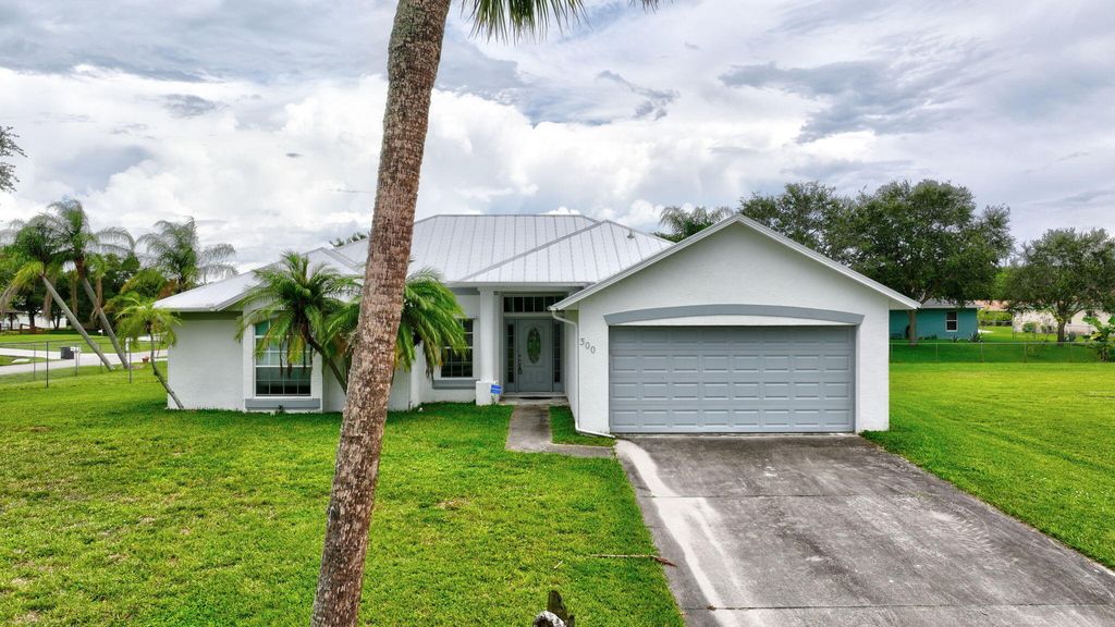 Photo of 300 Deerwood Lane, Fort Pierce, FL 34947 (MLS # R11011853)