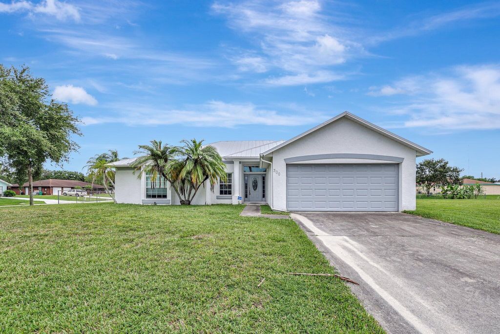 Photo of 300 Deerwood Lane, Fort Pierce, FL 34947 (MLS # R11011853)