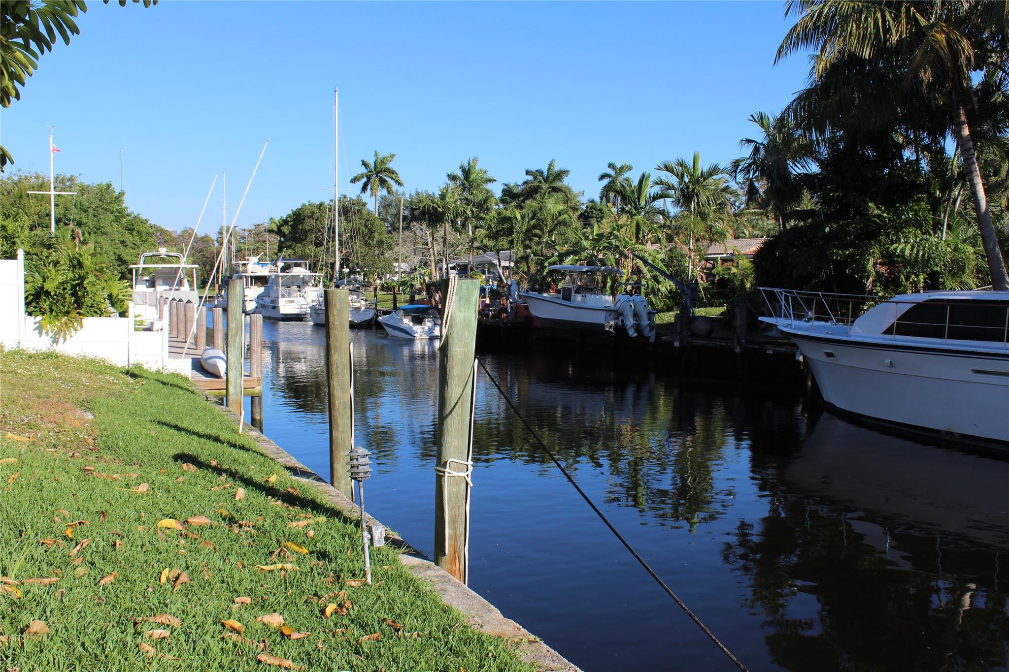 Charming and original 2/2 waterfront home. It's not about the upgrades, it's about the lifestyle!
This property offers what truly matters: private dock, ocean access, and NO fixed bridges — just minutes to the Intracoastal. Nestled in a quiet boating community, yet incredibly convenient to downtown Fort Lauderdale, major highways, and the airport. Perfect for boaters or anyone seeking a prime location with direct water access. Home is clean and functional, with vintage charm and endless potential. NO HOA! Bring your toys. Fast Approval. Fast Move-in.