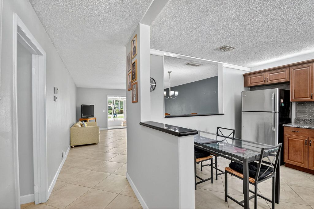 Photo of 165 Amherst Lane, Lake Worth, FL 33467 (MLS # B26011831)