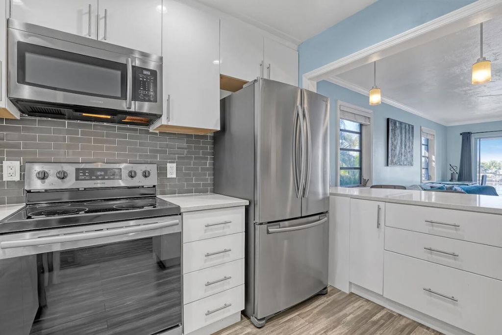 Photo of 531 W Kalmia Drive #2, Lake Park, FL 33403 (MLS # R11150446)