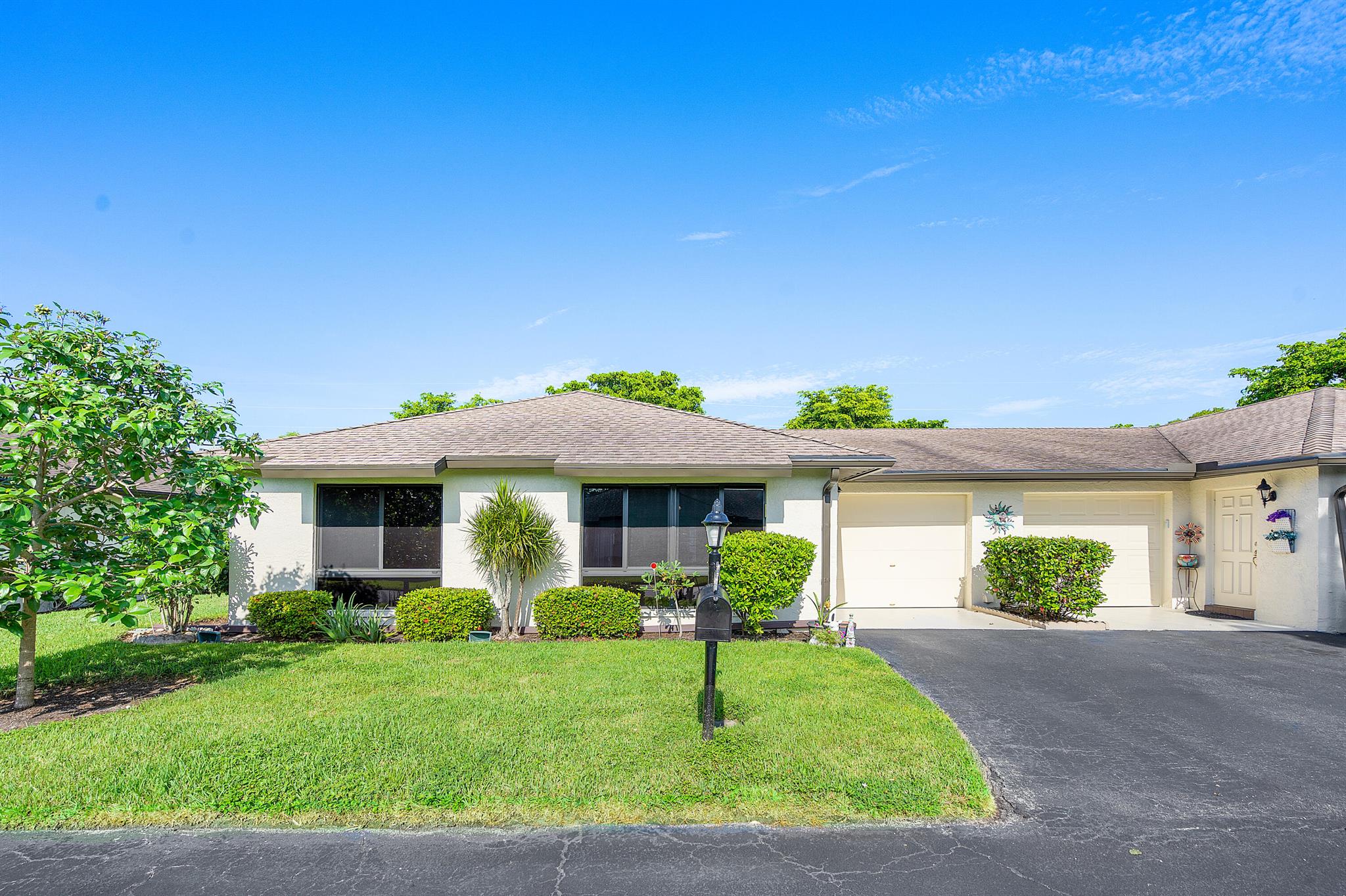 Beautifully Renovated Villa in Greentree Villas!This stunning villa features brand-new impact windows, a modern kitchen with granite countertops, water filtration system, and newer appliances, plus updated bathrooms for a fresh, move-in ready feel. Enjoy peace of mind with a new A/C (2024) and the convenience of Hotwire service, which includes basic cable and internet.The Greentree HOA takes care of it all--roof maintenance, exterior insurance, cable, water, landscaping, common areas, and trash--so you can focus on enjoying life. The community offers six pools, multiple clubhouses, and a prime location close to shopping, dining, movies, and hospitals.