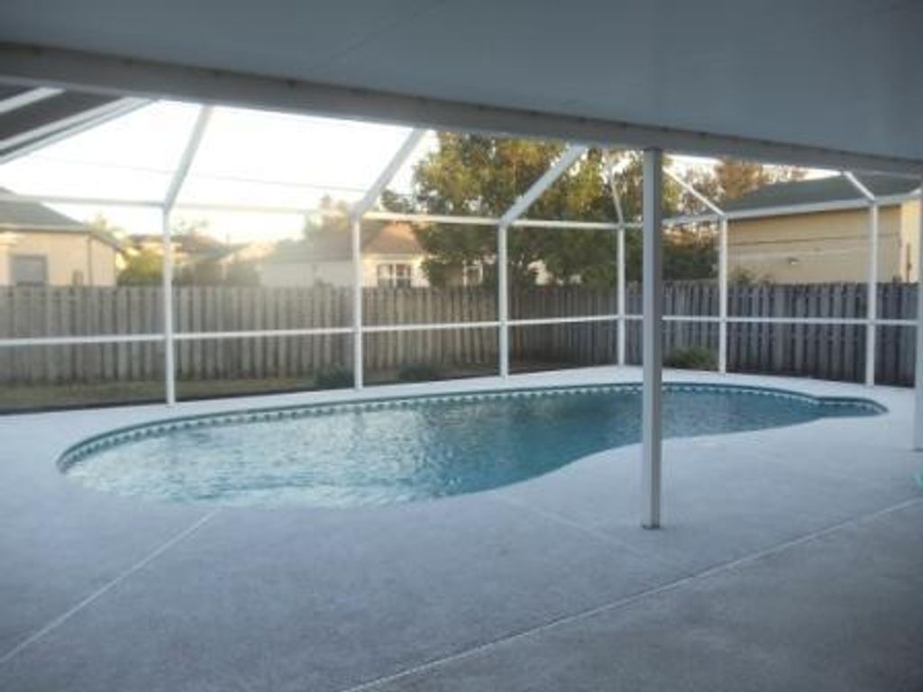 Photo of 3437 SW Ronald Street, Port Saint Lucie, FL 34953 (MLS # R11050513)