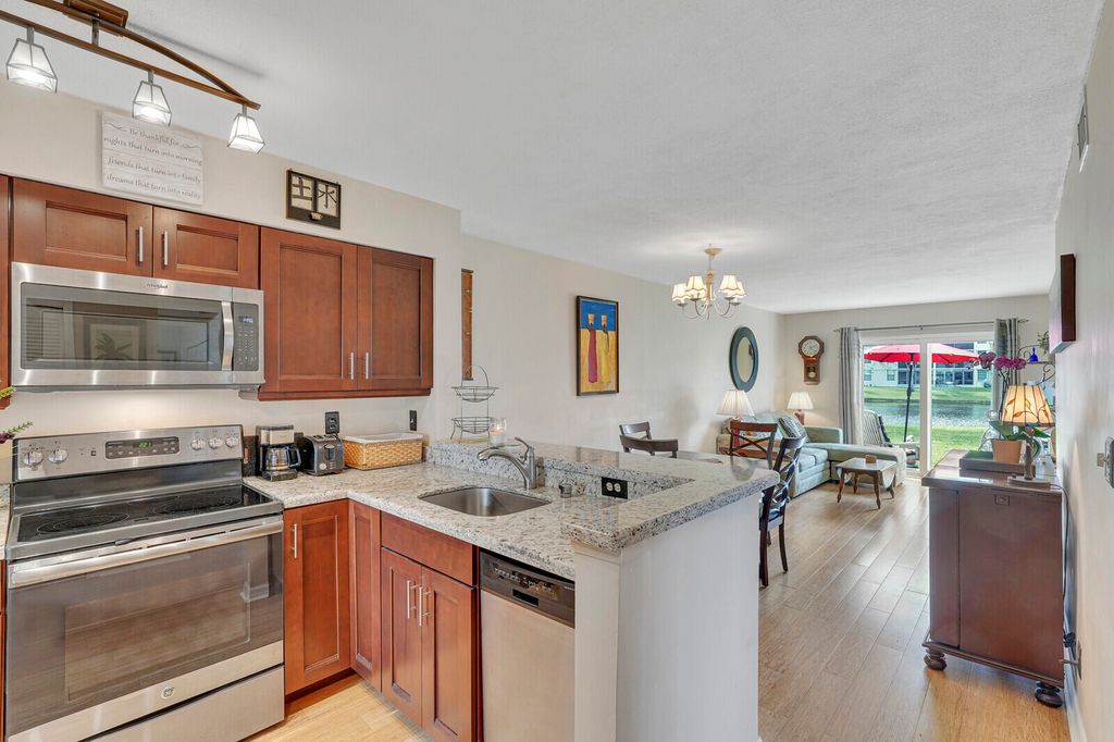 Photo of 2108 S Cypress Bend Drive #110, Pompano Beach, FL 33069 (MLS # R10965904)