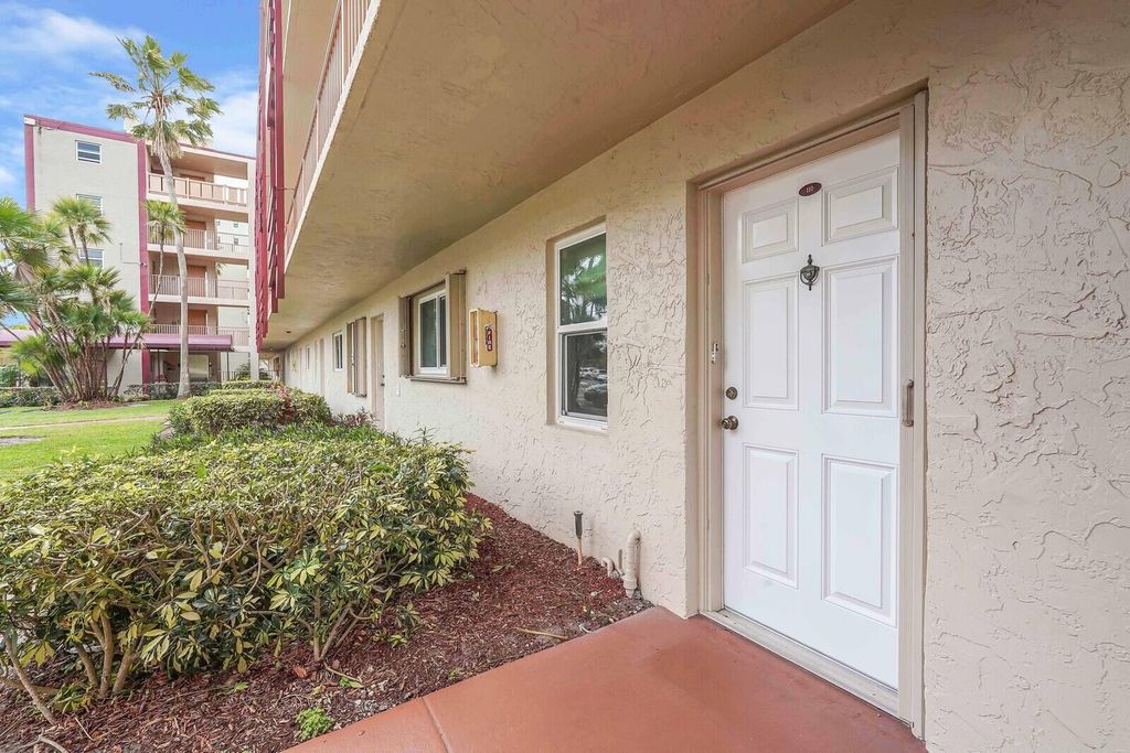 Photo of 2108 S Cypress Bend Drive #110, Pompano Beach, FL 33069 (MLS # R10965904)