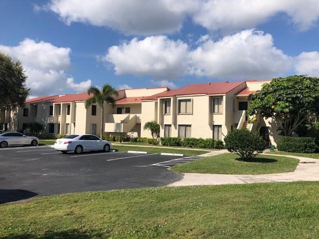 Photo of 5111 SE Miles Grant Rd #205, Stuart, FL 34997 (MLS # F10369116)