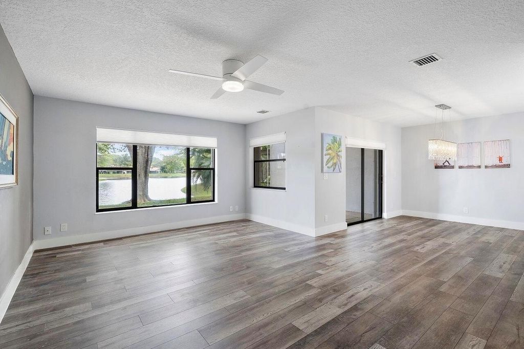 Photo of 624 N Deer Creek North Shore Drive N, Deerfield Beach, FL 33442 (MLS # R11133668)