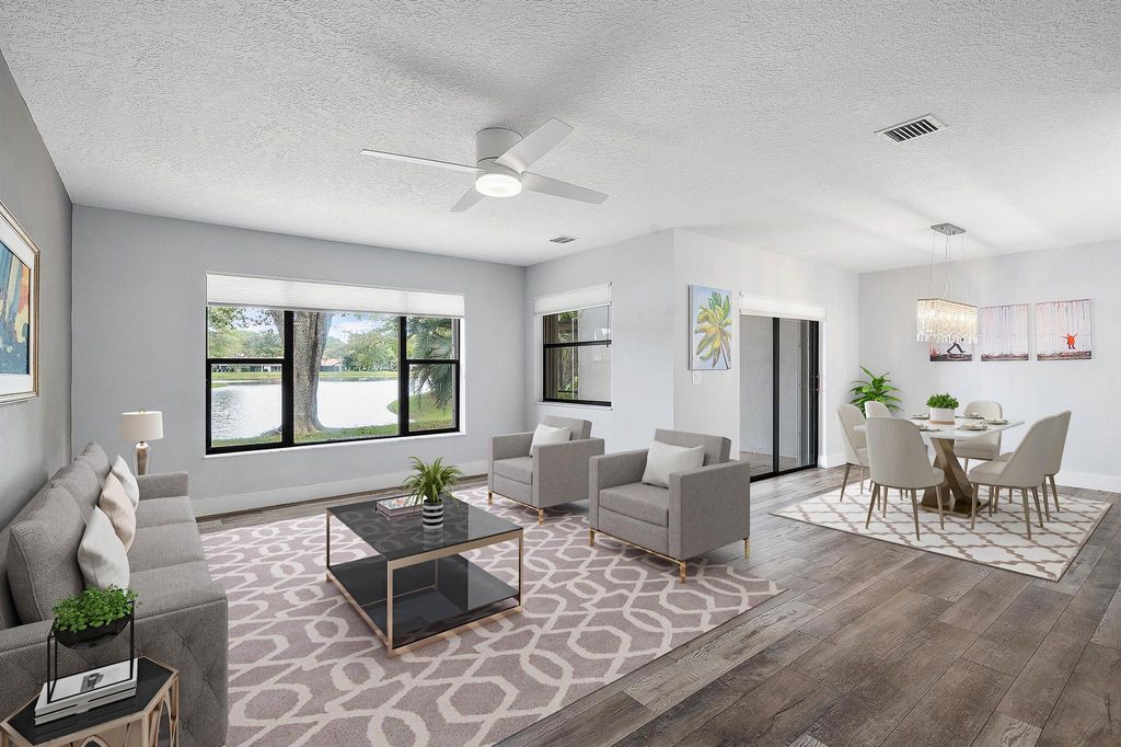 Photo of 624 N Deer Creek North Shore Drive N, Deerfield Beach, FL 33442 (MLS # R11133668)