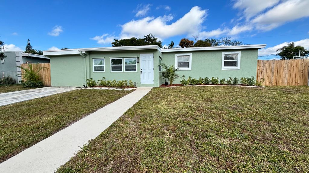 Photo of 3945 Ocala Road, Lake Worth, FL 33462 (MLS # R11151444)