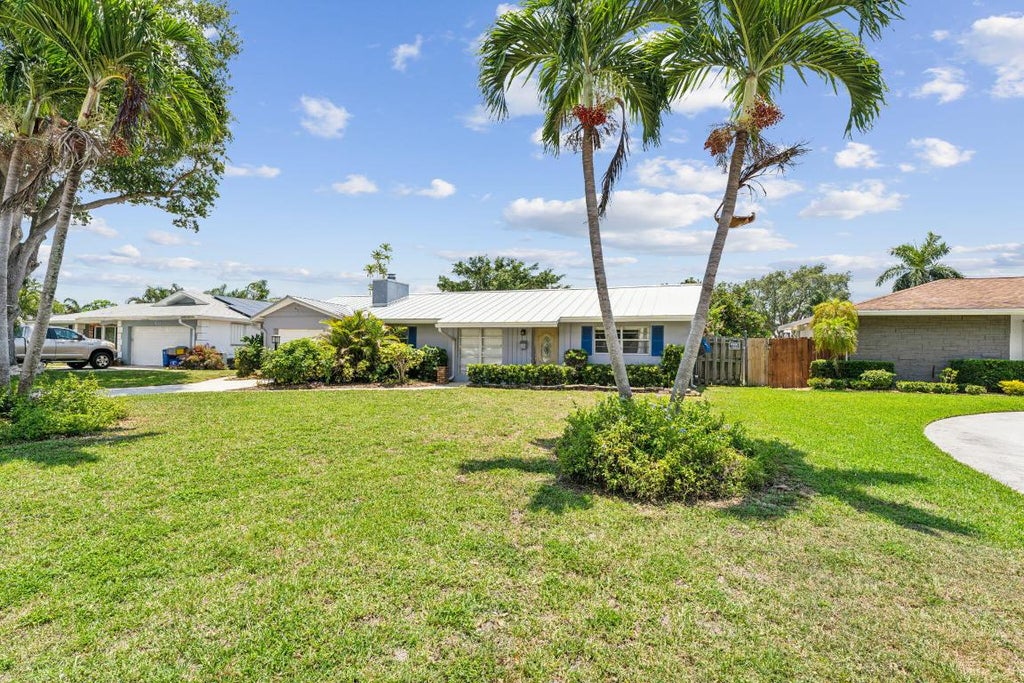 Photo of 4194 Honeysuckle Avenue, Palm Beach Gardens, FL 33410 (MLS # R11016798)