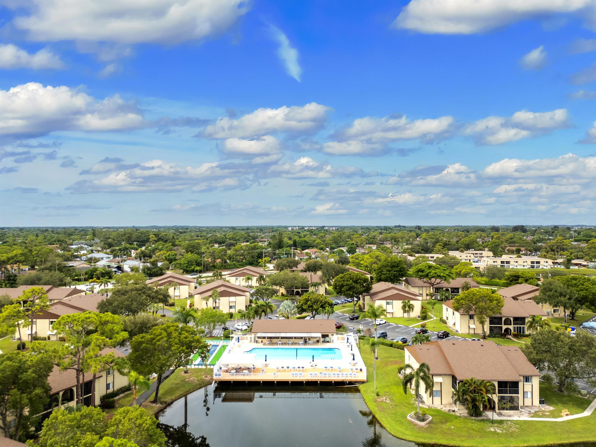 Step into this beautifully maintained first-floor condo and instantly feel at home. Every detail has been cared for by the owners, creating a space that is spotless, inviting, and truly move-in ready. Offered fully furnished, it's the perfect blend of comfort and convenience. Tucked away in a quiet corner of this 55+ community, you'll enjoy peaceful preserve views with no cars constantly passing by--just serenity outside your door. Inside, the smart layout provides effortless flow, while a thoughtfully designed laundry room/pantry adds both function and style, with custom cabinetry that conceals the HVAC and water heater while providing valuable extra storage. You're only a short walk to the clubhouse, pool, and bocce courts, and recent community upgrades--including a new roof,