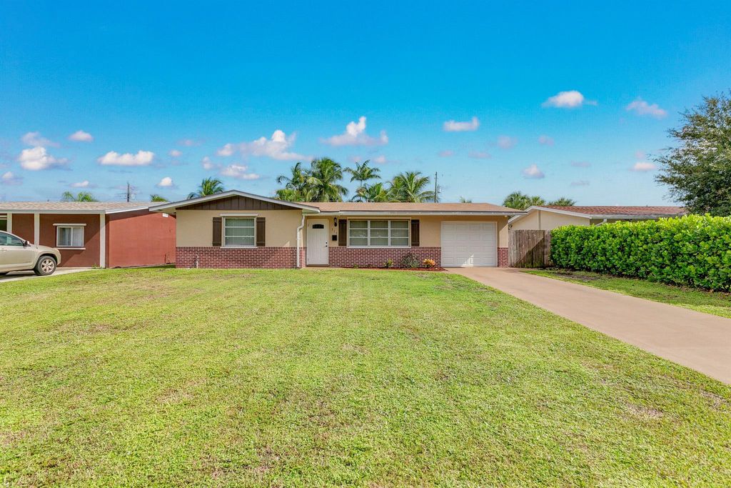 Photo of 310 Camellia Street, Palm Beach Gardens, FL 33410 (MLS # R10919262)