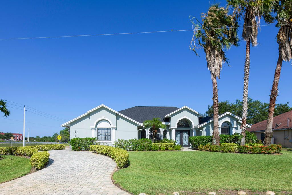 Photo of 3401 SW San Benito Street, Port Saint Lucie, FL 34953 (MLS # R10992925)
