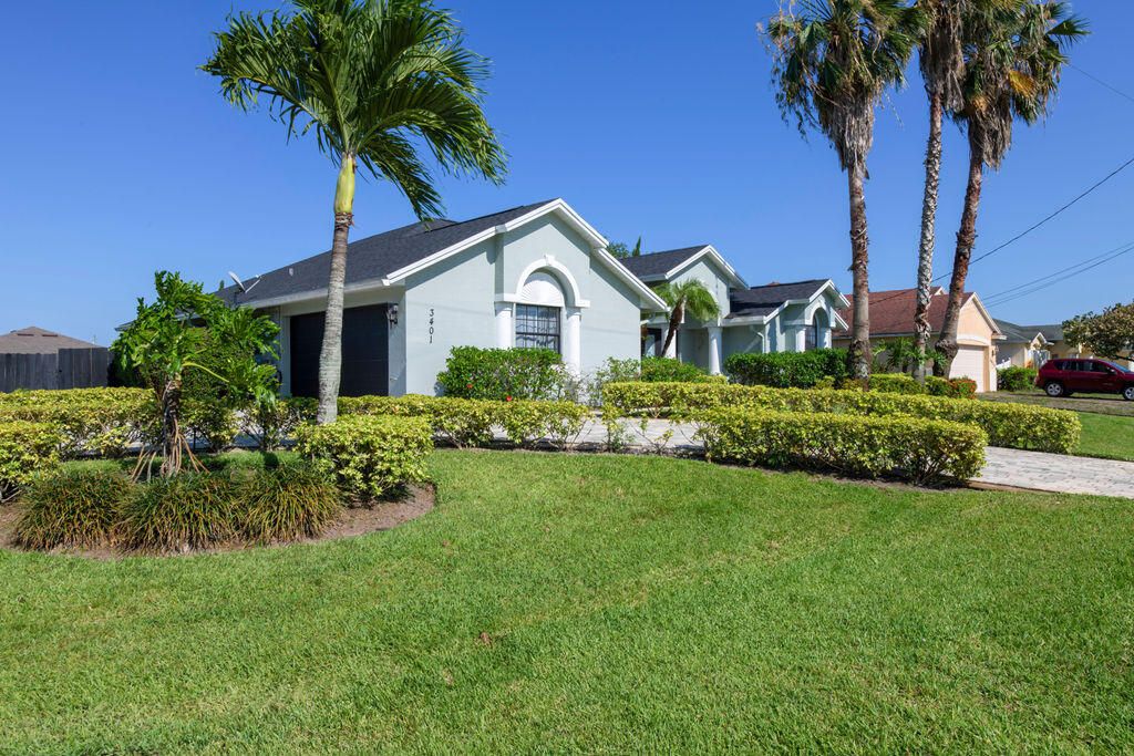 Photo of 3401 SW San Benito Street, Port Saint Lucie, FL 34953 (MLS # R10992925)